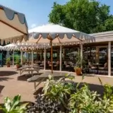 Men's walk & talk group at Hampstead Heath cafe patio